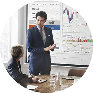 a man standing in front of a board explaining planning capabilities within SAP